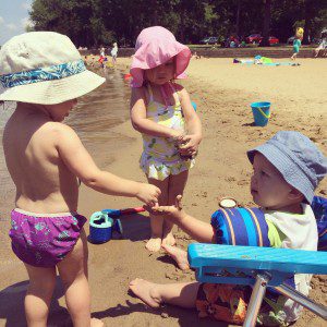 Nora, Elvira and Oscar play on the beach at Cook Recreation Area.
