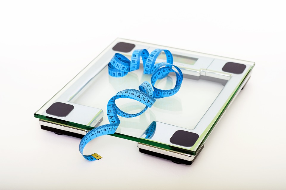 scale-and-measuring-tape prevent weight gain meal prep