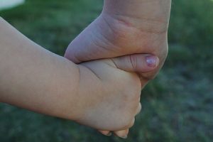 holding hands children including others Nashville Moms Blog